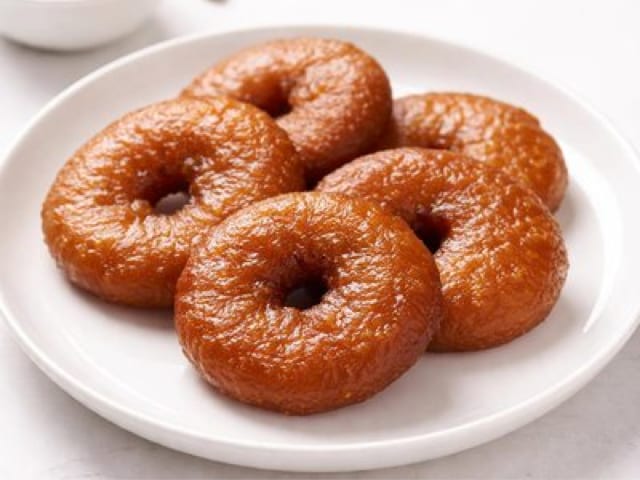 Adhirasam (jaggery and rice-flour fritter) — photograph