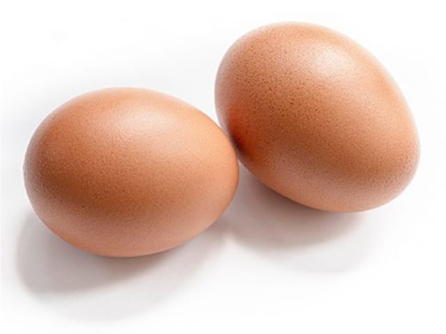 Hen's egg, whole — yolk and white — photograph