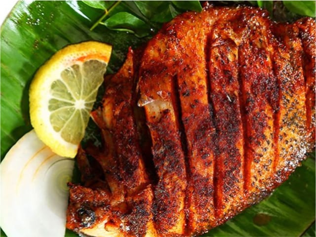 Pearl spot (Etroplus suratensis) — and the tilapia sold under the same name — photograph